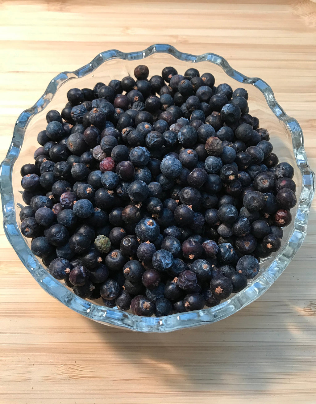 Organic Juniper Berries.  Dried juniper berries have a citrusy woodsy scent with a distinctive flavour popular in Northern European cuisine.  Other uses for juniper berries include brewing tea, meat dishes, and in sauerkraut.
